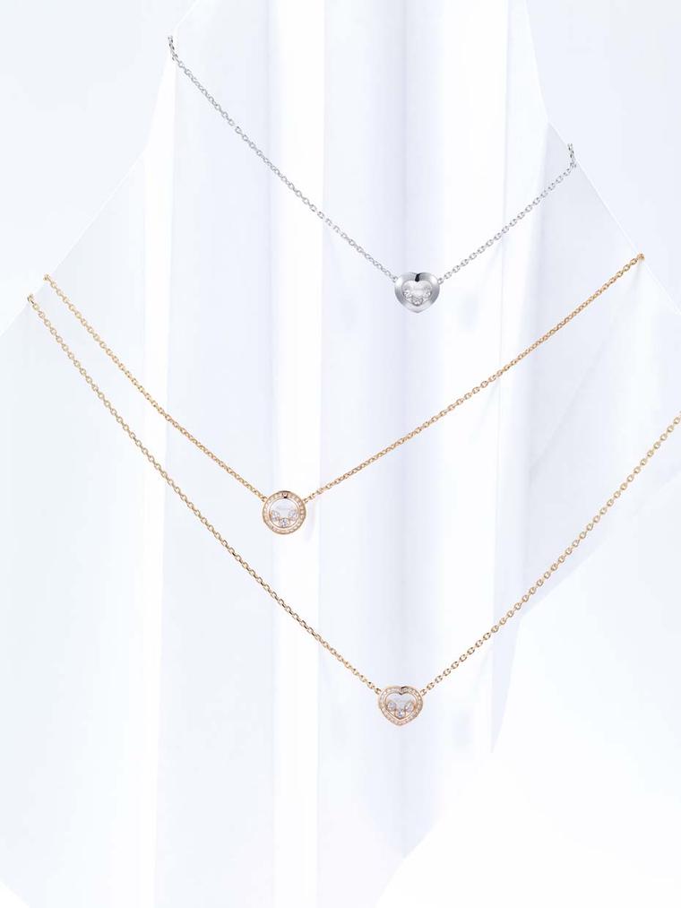 Chopard necklace from the Happy Curves collection in white or rose gold with either a circular or heart motif carrying three freely moving brilliant-cut diamonds.