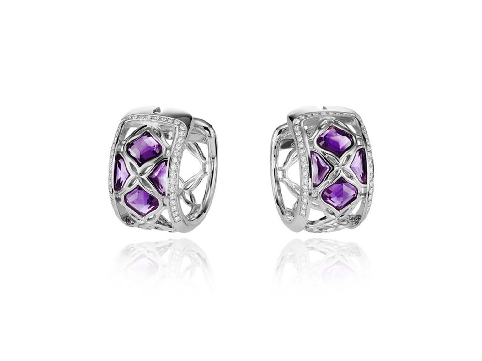 Chopard Imperiale earrings featuring faceted amethysts encompassed by diamond-encrusted arabesque motifs.