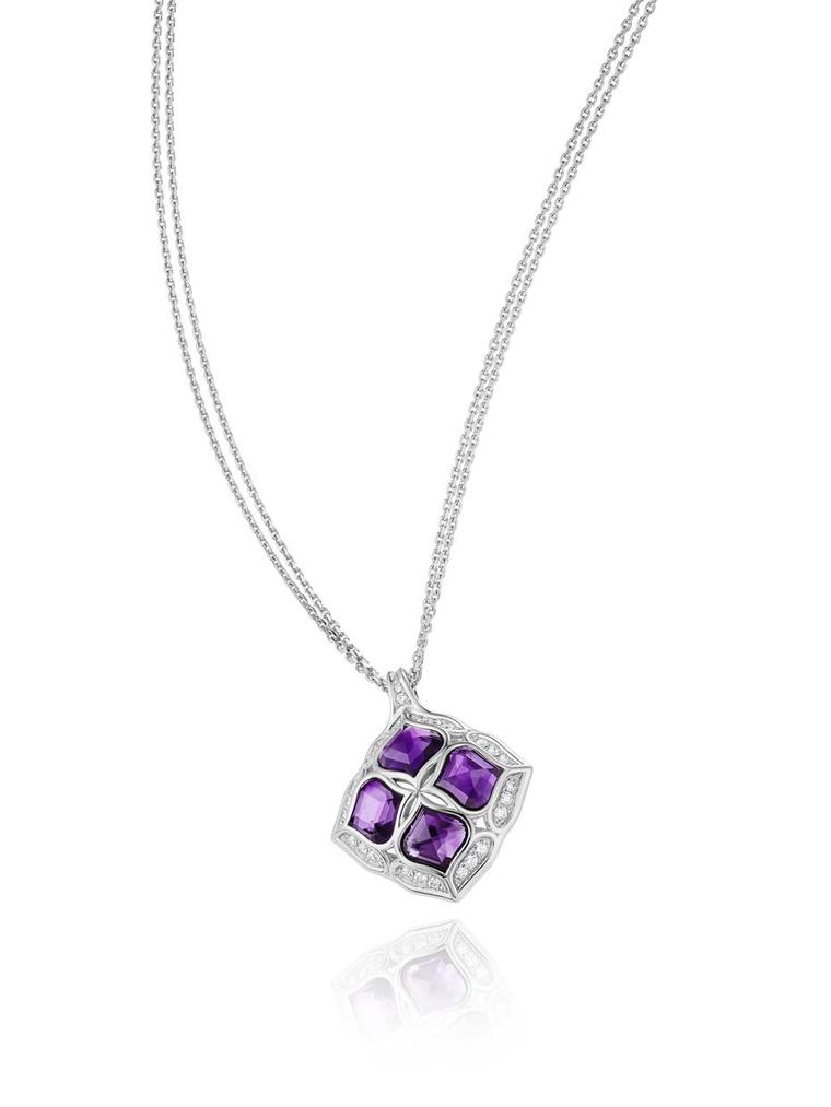 Chopard Imperiale pendant featuring a faceted amethyst surrounded by diamond-encrusted arabesque motifs.