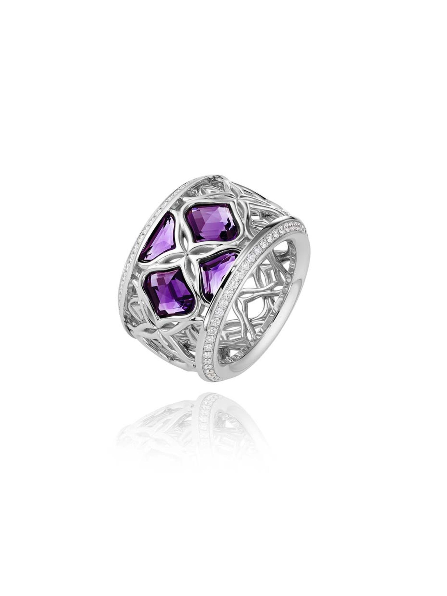 Chopard Imperiale ring featuring a facetted amethyst surrounded by arabesque motifs and diamonds.