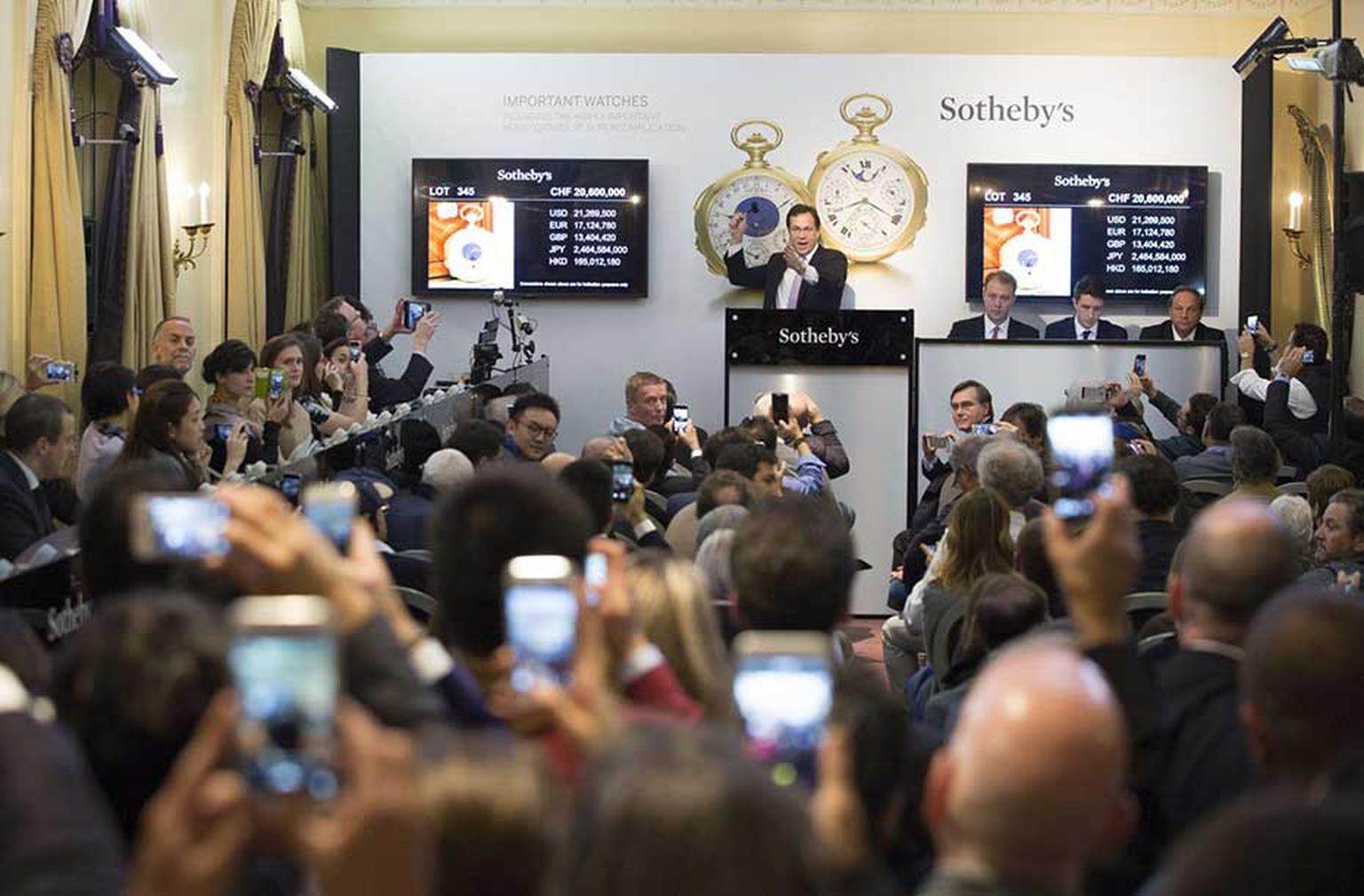 The room at Sotheby's Geneva auction house erupted into wild cheering and applause as auctioneer and consultant Aurel Bacs, who spent most of the sale consulting somebody by phone, secured the Graves Supercomplication pocket watch for $24 million, making 