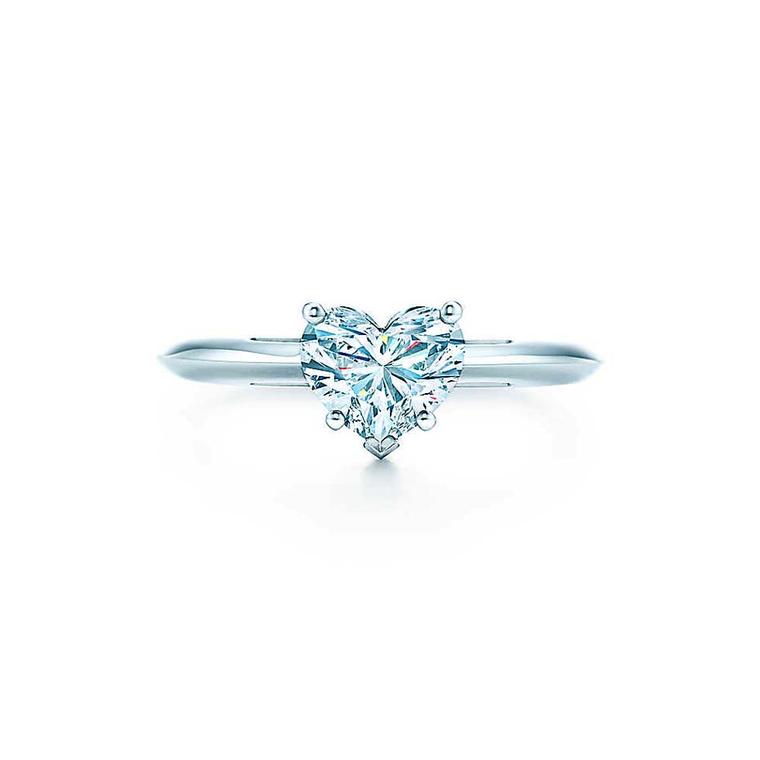 Tiffany & Co. classic diamond engagement ring with a single heart-shaped diamond.