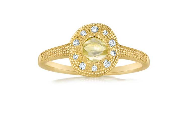 De Beers Talisman solitaire diamond engagement ring featuring round brilliant diamonds surrounding a rough diamond (£2,100).