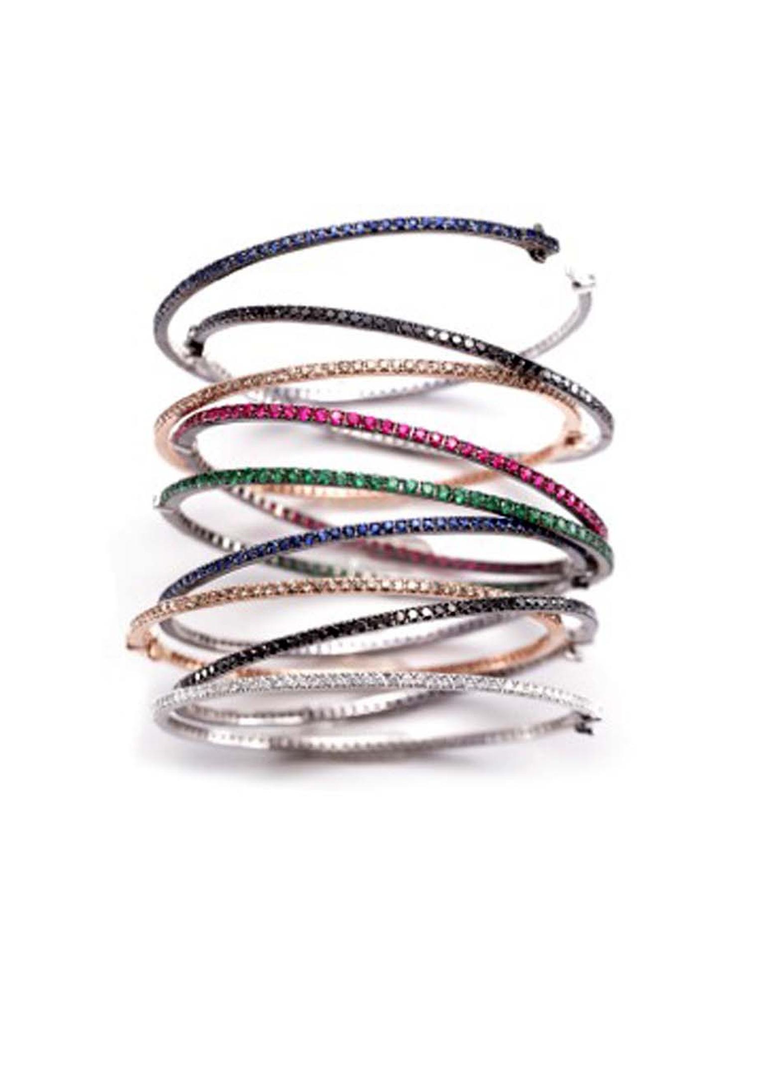 Nam Cho bangles are available in a rainbow of colours from classic white diamonds to orange, pink, purple and blue sapphires.