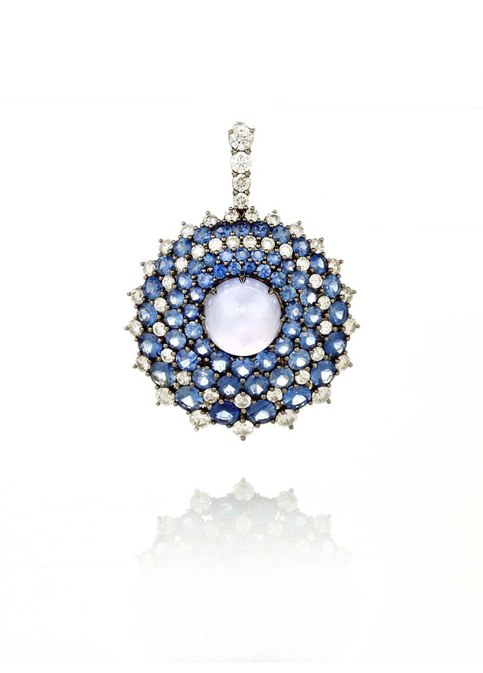 Nam Cho Riviera convertible pendant and pin with a central pastel blue chalcedony orb surrounded by circles of random pavé-set faceted sapphires and diamonds (from $26,500).