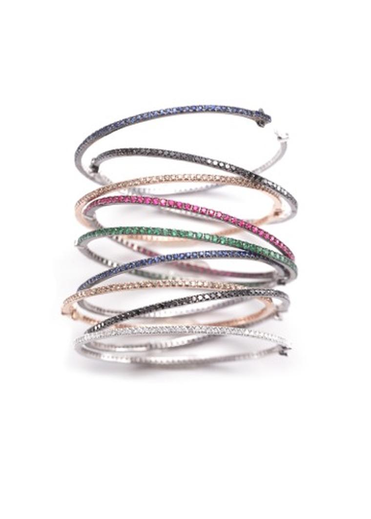 Nam Cho 1.00ct bangles featuring black, champagne and white diamonds as well as colored sapphires, rubies and emeralds, available in white or pink gold (from $4,570).