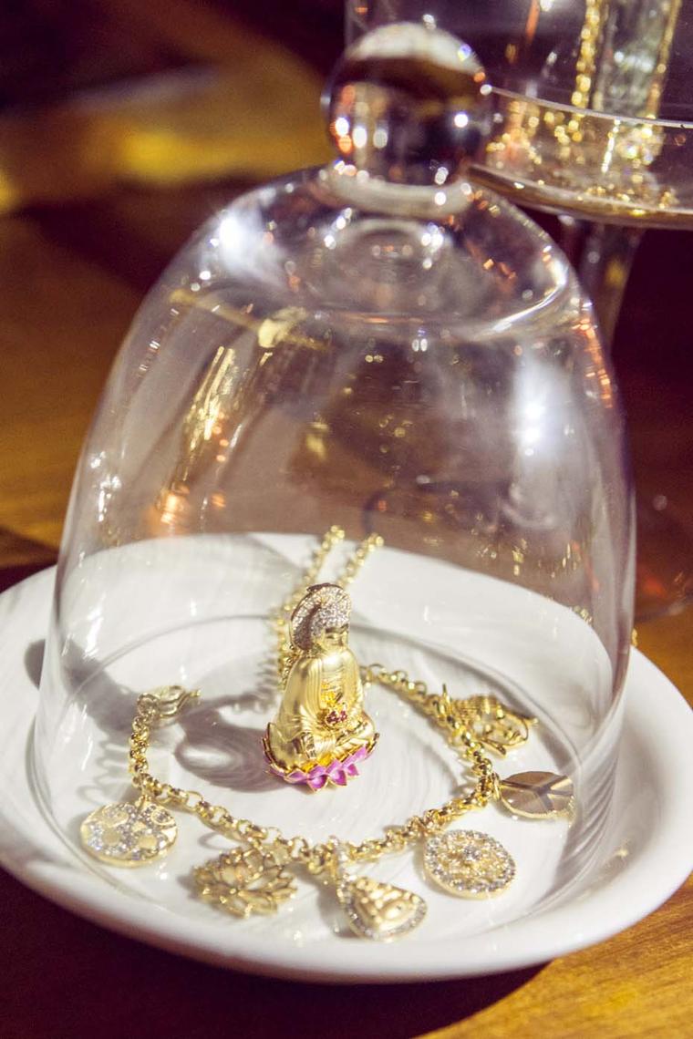 Buddha Mama Ganesha ring surrounded by an Auspicious charm bracelet, pictured at the New York launch party.