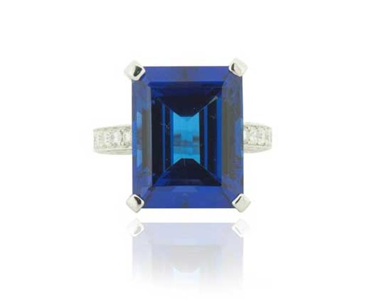 Diacolor diamond ring set with a 21.88ct step-cut tanzanite.