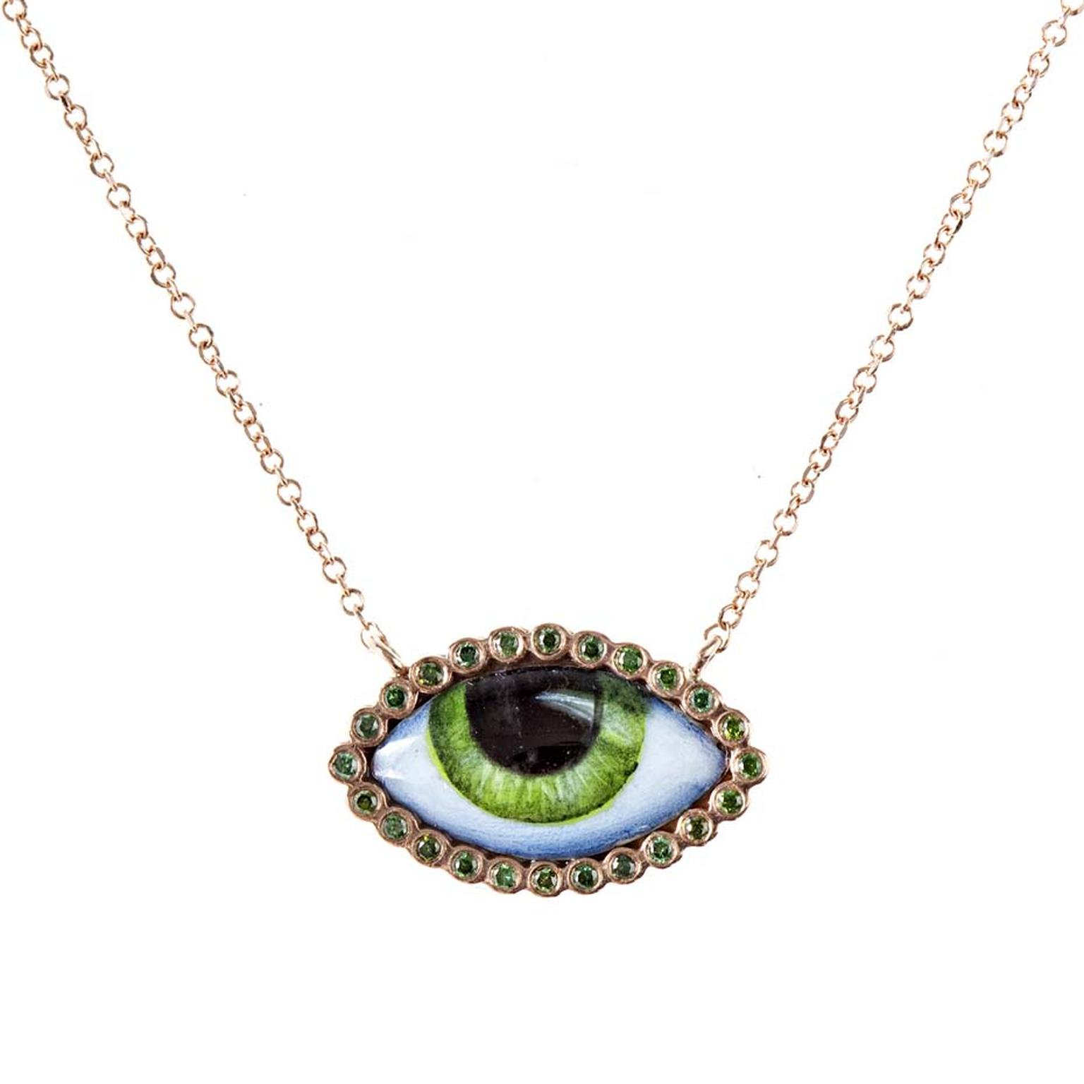 Lito Her Tu Es Partout necklace in rose gold featuring a green enamelled eye surrounded by green diamonds ($1,070).