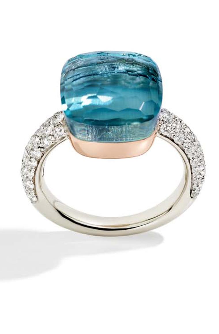 Pomellato Nudo ring in white gold and diamonds, set with a blue topaz.