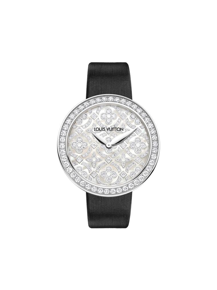 Louis Vuitton Dentelle de Monogram watch in white gold featuring an engraved white mother-of-pearl dial with the Louis Vuitton flower motif set with diamonds.