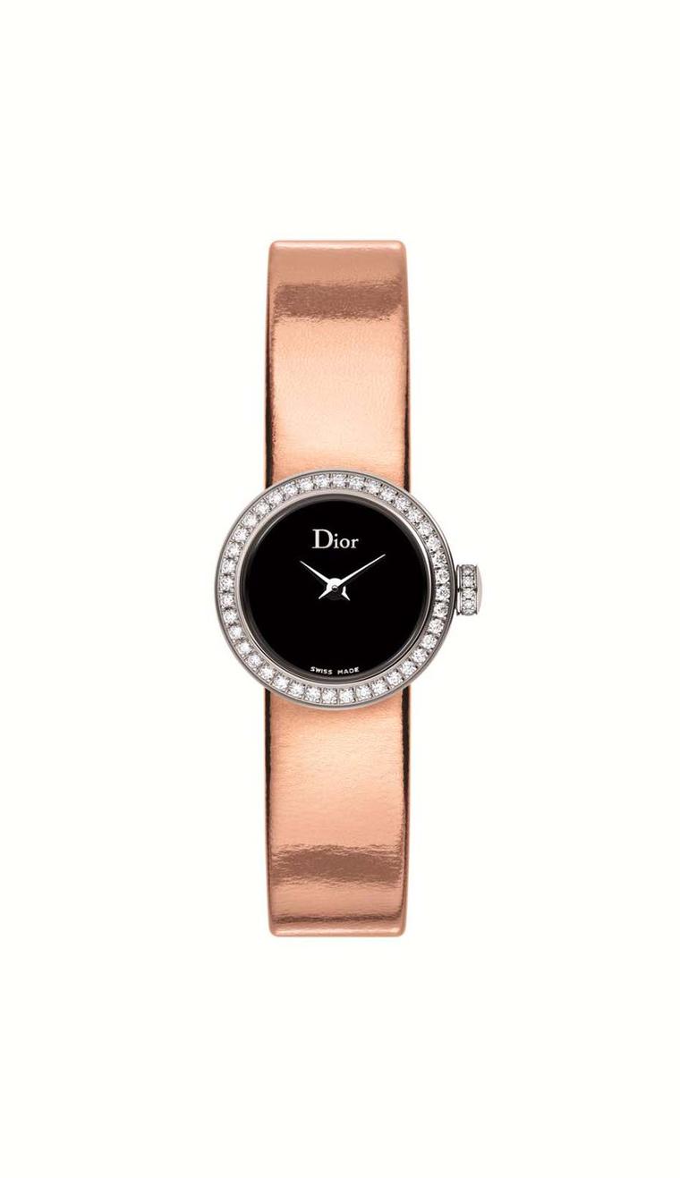 This La Mini D de Dior watch measures just 19mm across. With an inky black mother-of-pearl dial set alight with diamonds on the bezel and crown, a sumptuous metallic leather strap adds the finishing touch (£2,900).