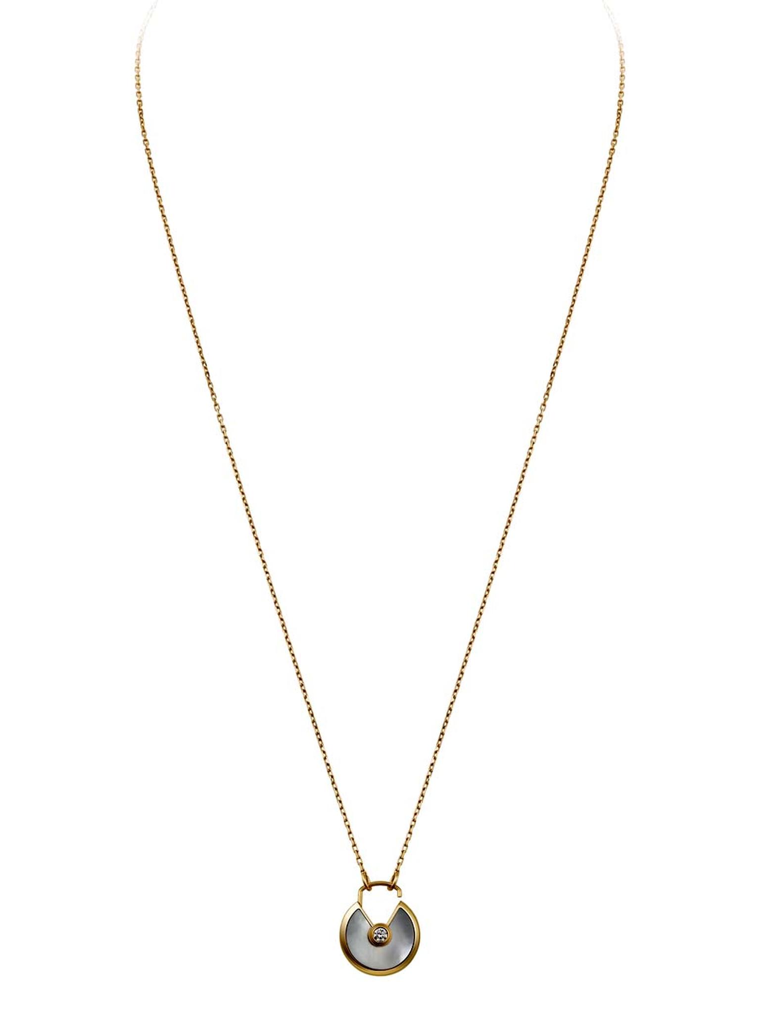 Cartier Amulette de Cartier necklace in yellow gold with white mother-of-pearl and a brilliant-cut diamond (£2,980).