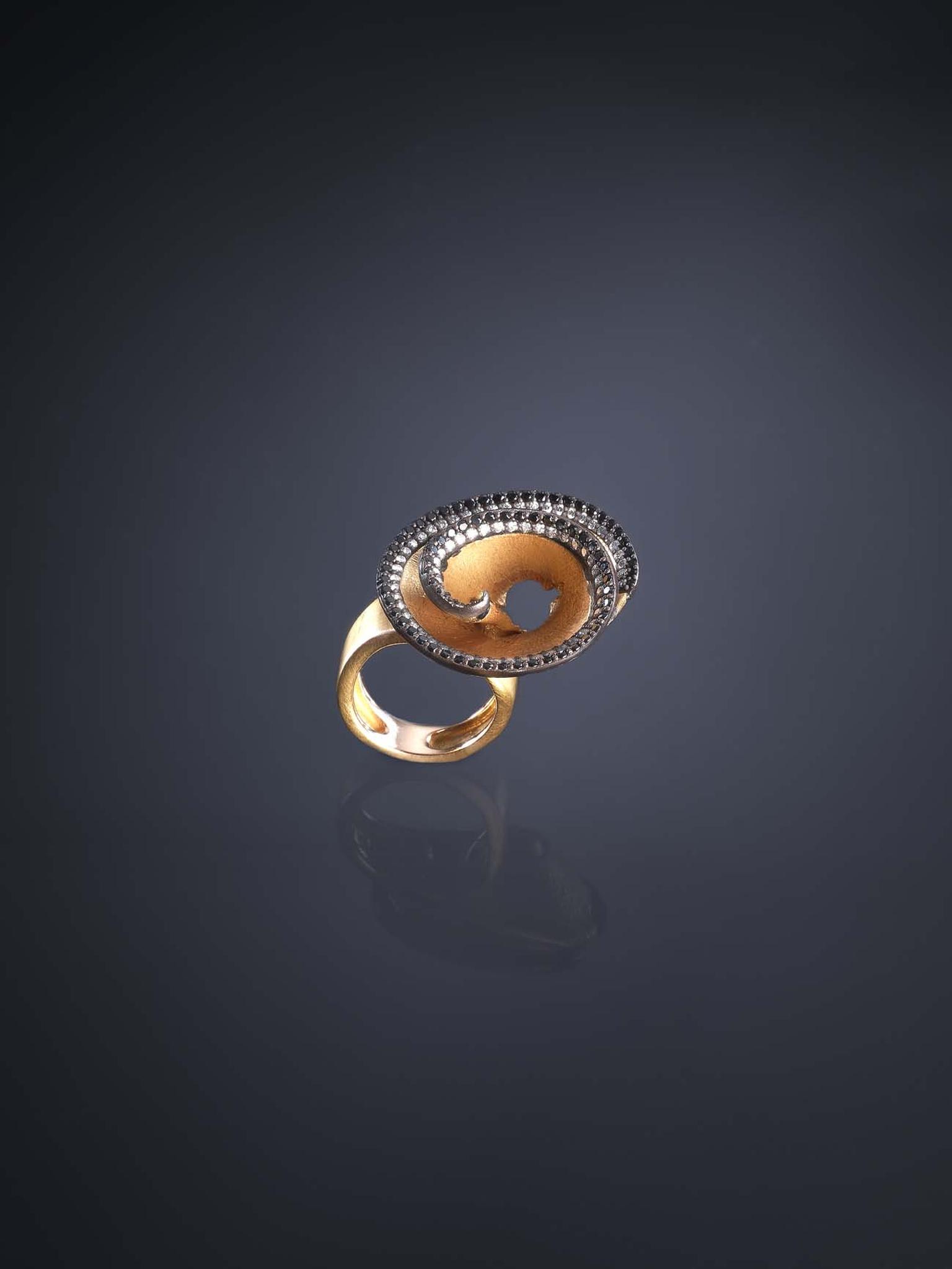 Gold ring from the Luz Camino Pencil Shavings collection with spinels and diamonds.