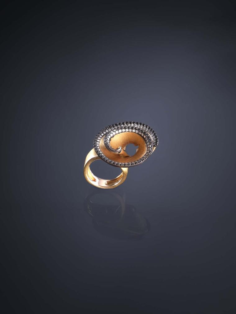 Gold ring from the Luz Camino Pencil Shavings collection with spinels and diamonds.