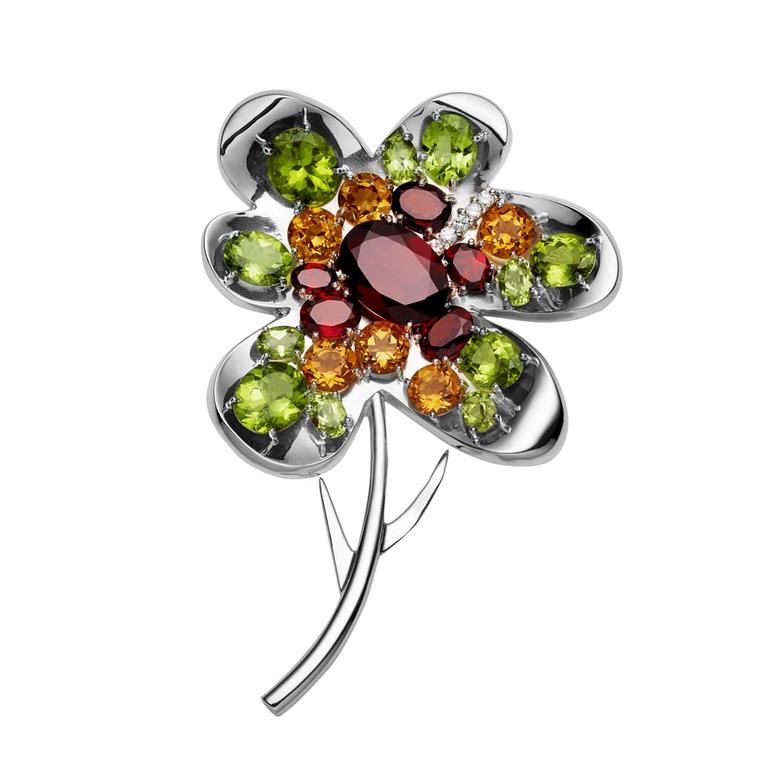 Jan Logan for Collette Dinnigan brooch. Logan launched a range of floral brooches, created in collaboration with the Australian fashion designer Collette Dinnigan, in Paris in 2000.