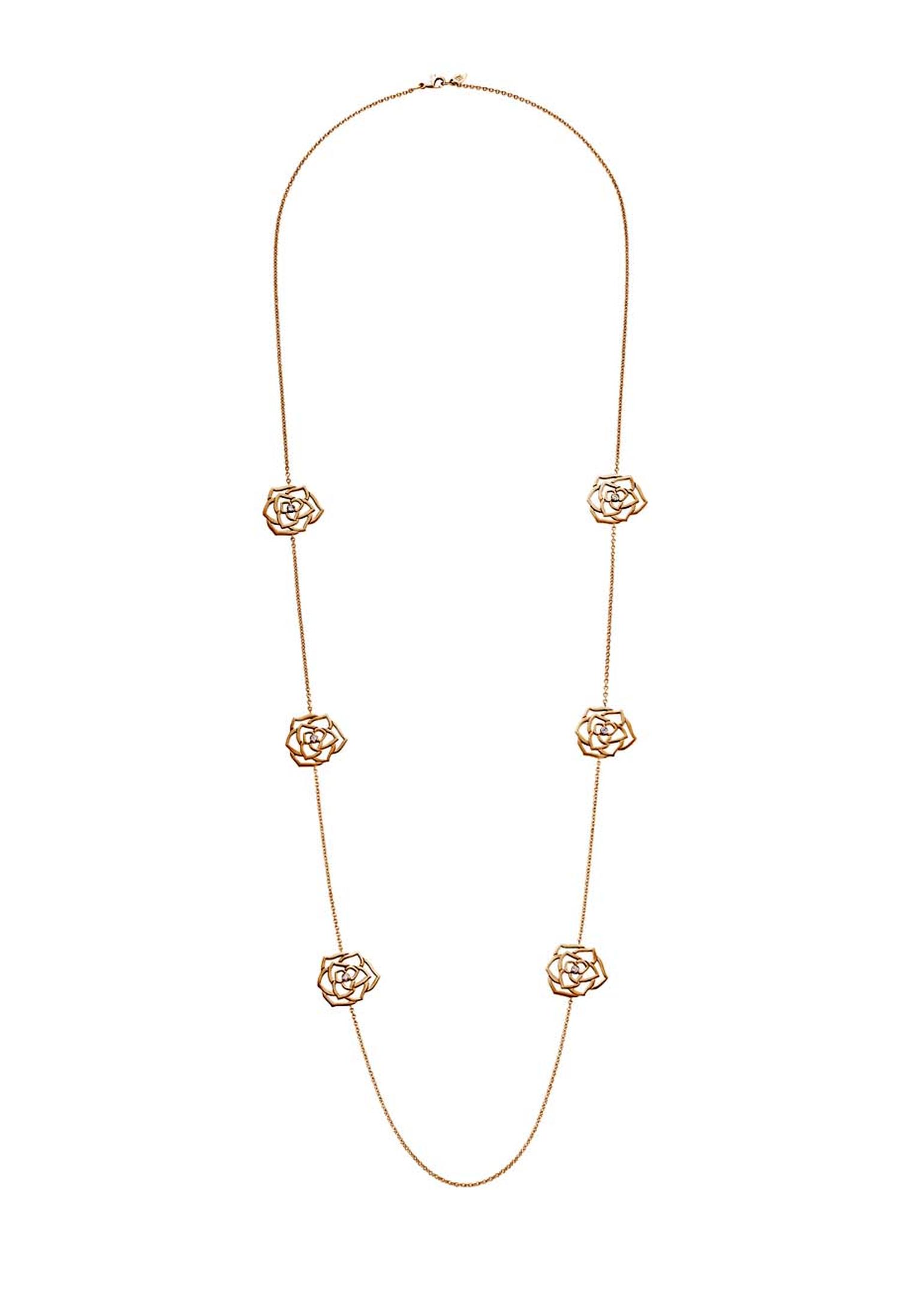 Piaget Rose necklace in rose gold. Measuring over a metre in length, it features six symmetrically placed roses with a diamond nestling in the centre of each (£6,600).