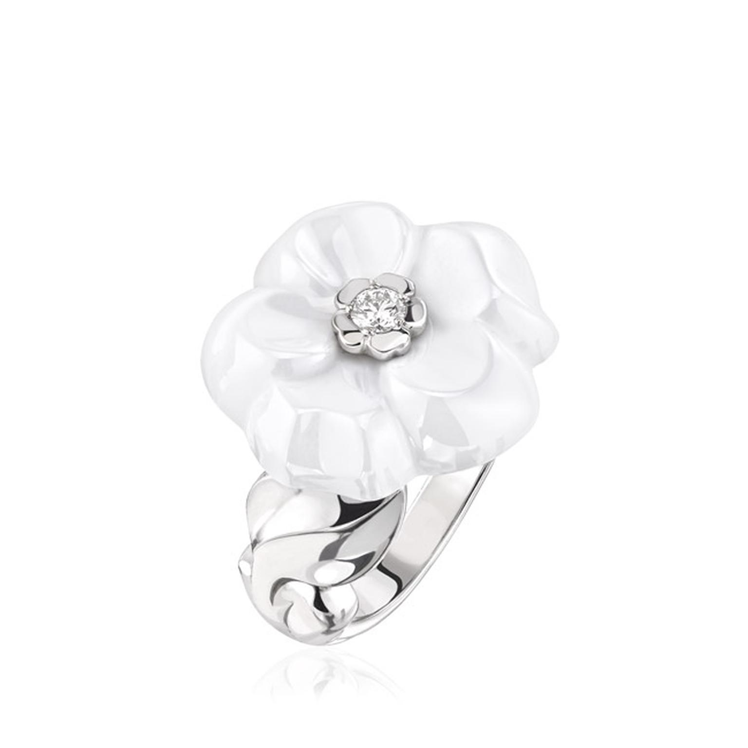 Chanel Camélia Galbé small white ceramic ring with a brilliant-cut white diamond at its heart, set on a twisted white gold band (£2,850).