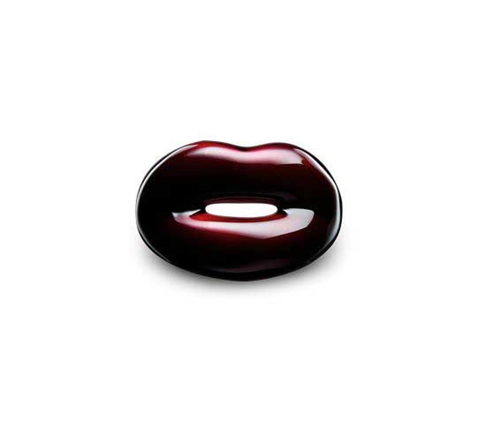 The Solange Azagury-Partridge Hotlips ring in yellow gold and black cherry lacquer is a cult classic (£1,500).