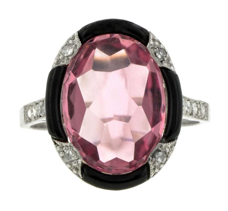 Edwardian platinum ring with a centre pink tourmaline surrounded by diamonds and black enamelling, circa 1915. Available from Doyle & Doyle ($5,200).