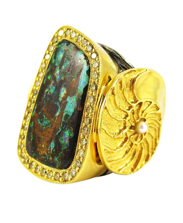 K. Brunini Objects Organique ring in gold and silver with an opal surrounded by diamonds.