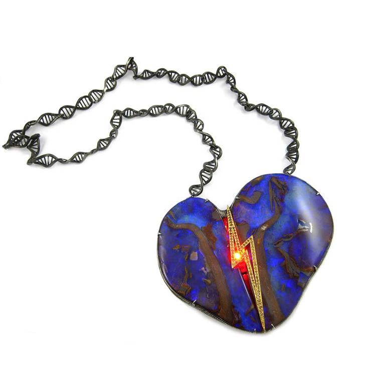 The K. Brunini Robot Heart opal necklace literally "beats", coming alive with a flash of red and a lightning bolt of orange diamonds lit by LED technology.