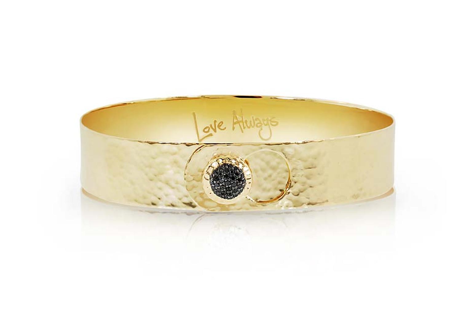 Phillips House Love Always gold bracelet featuring a black diamond ($4,100).