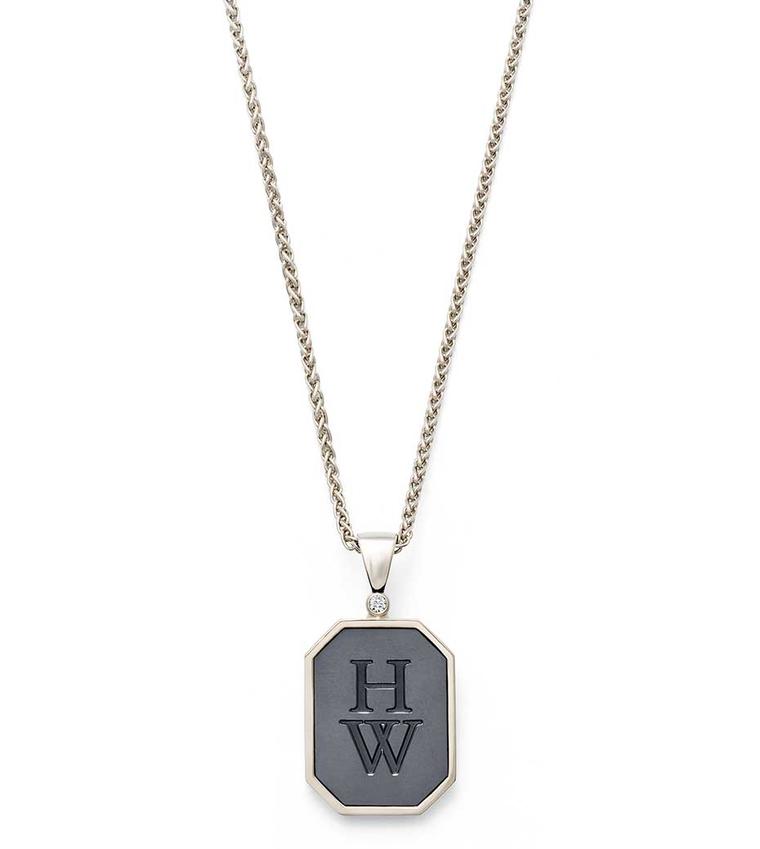 Harry Winston Zalium HW Logo pendant in white gold and Zalium, set with a round-brilliant diamond.