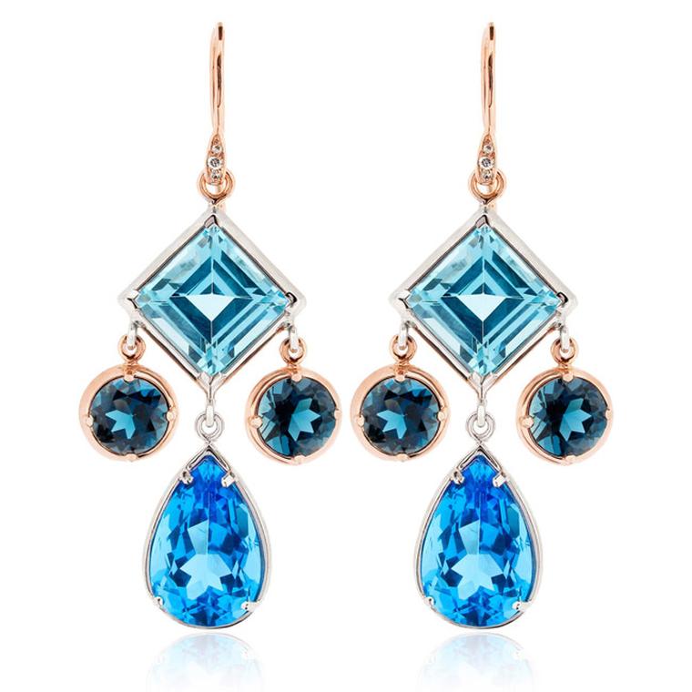 Dinny Hall Amelie Anniversary earrings featuring Ostro, London and Swiss blue topaz with sterling silver and rose gold. The mini chandelier earrings, with the three blue hues and three different gemstone cuts, showcase Dinny Hall's signature bohemian styl