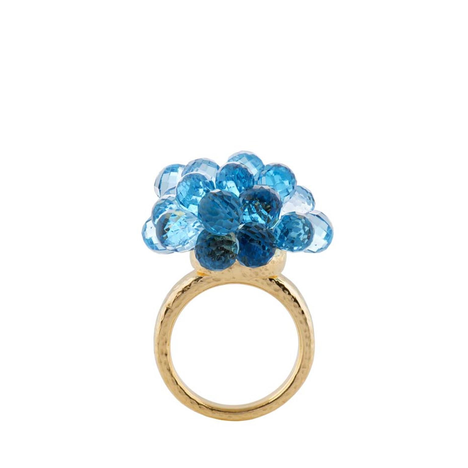 Biiju Explosion ring featuring Swiss Blue topaz set in gold (£2,775).