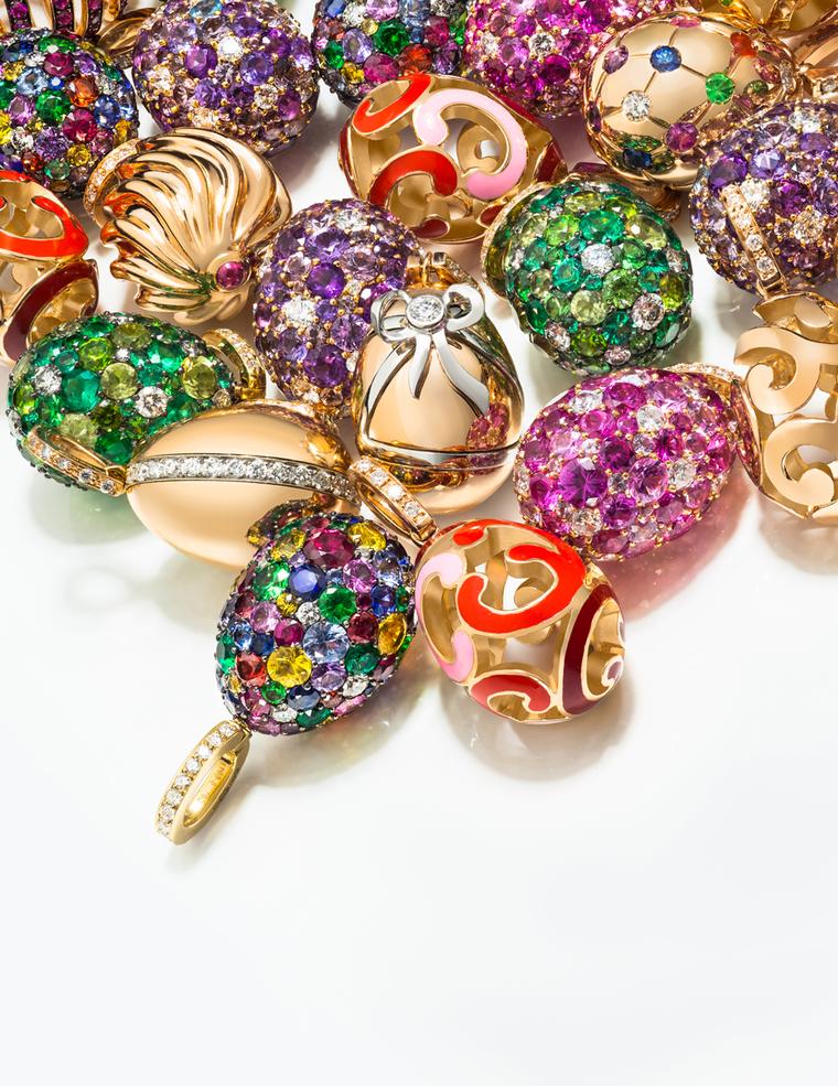 Fabergé's playful new Egg Charms, which can be fastened to a bracelet or worn on a chain around the neck, are punctuated with candy-bright gemstones, deeply ridged golden swirls or lustrous enamel.