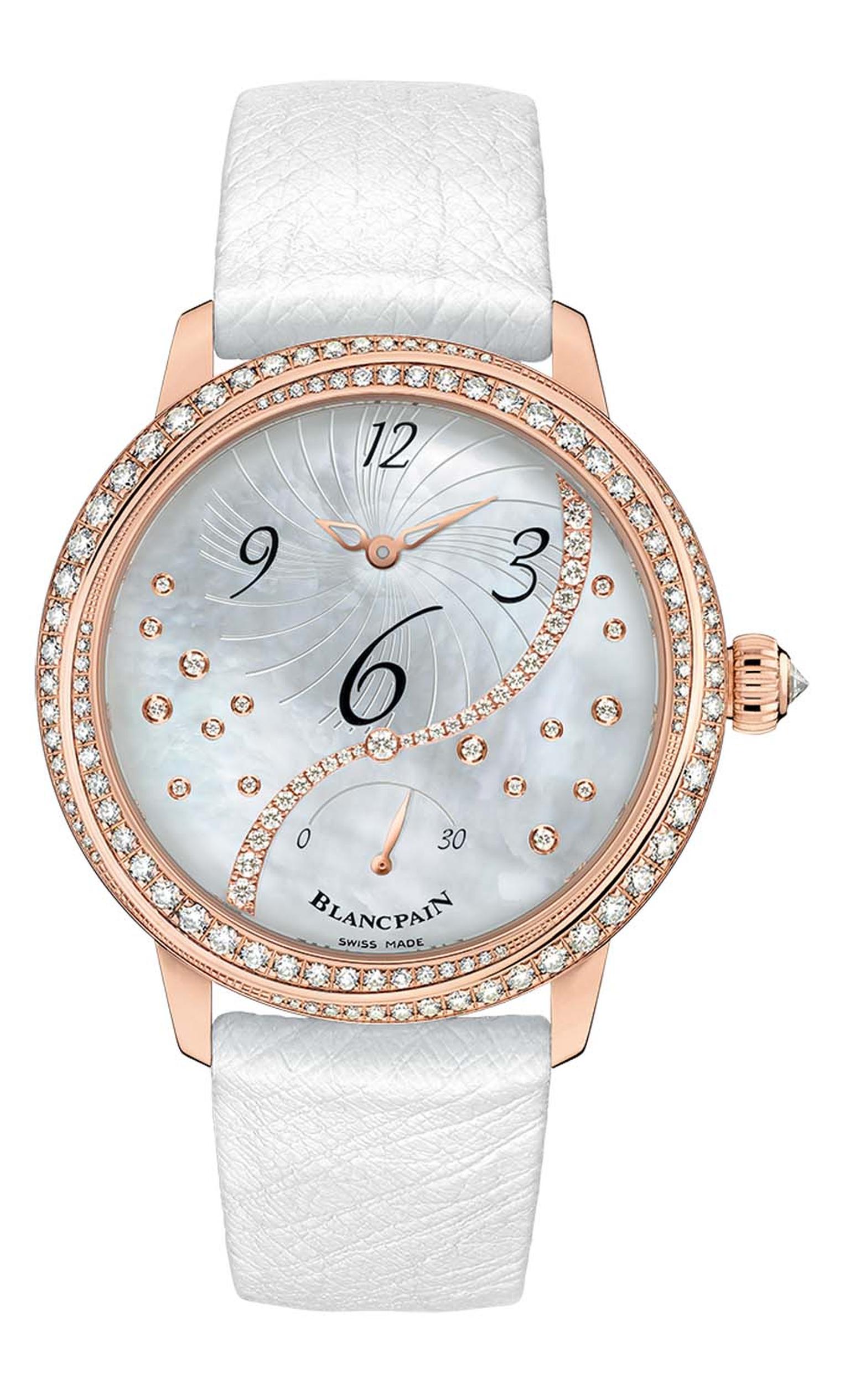 Blancpain Heure Décentrée watch comes in a 36.8mm rose gold case set with 108 diamonds and a dial featuring interwoven ribbons that embrace the contours of the case.