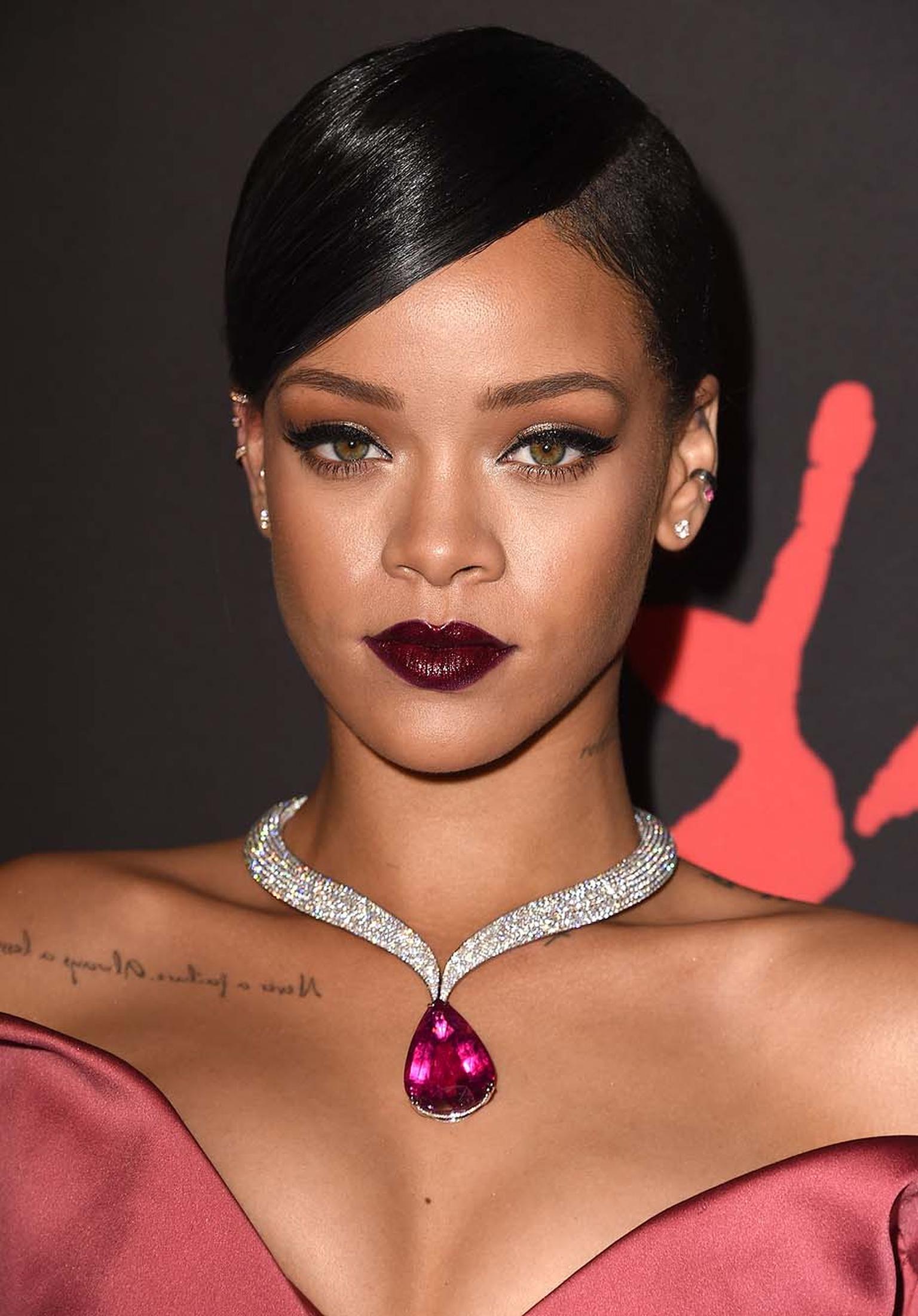 Perching just above Rihanna's racy décolleté, the curvaceous singer flaunted a bright pink rubellite and diamond Chopard necklace.