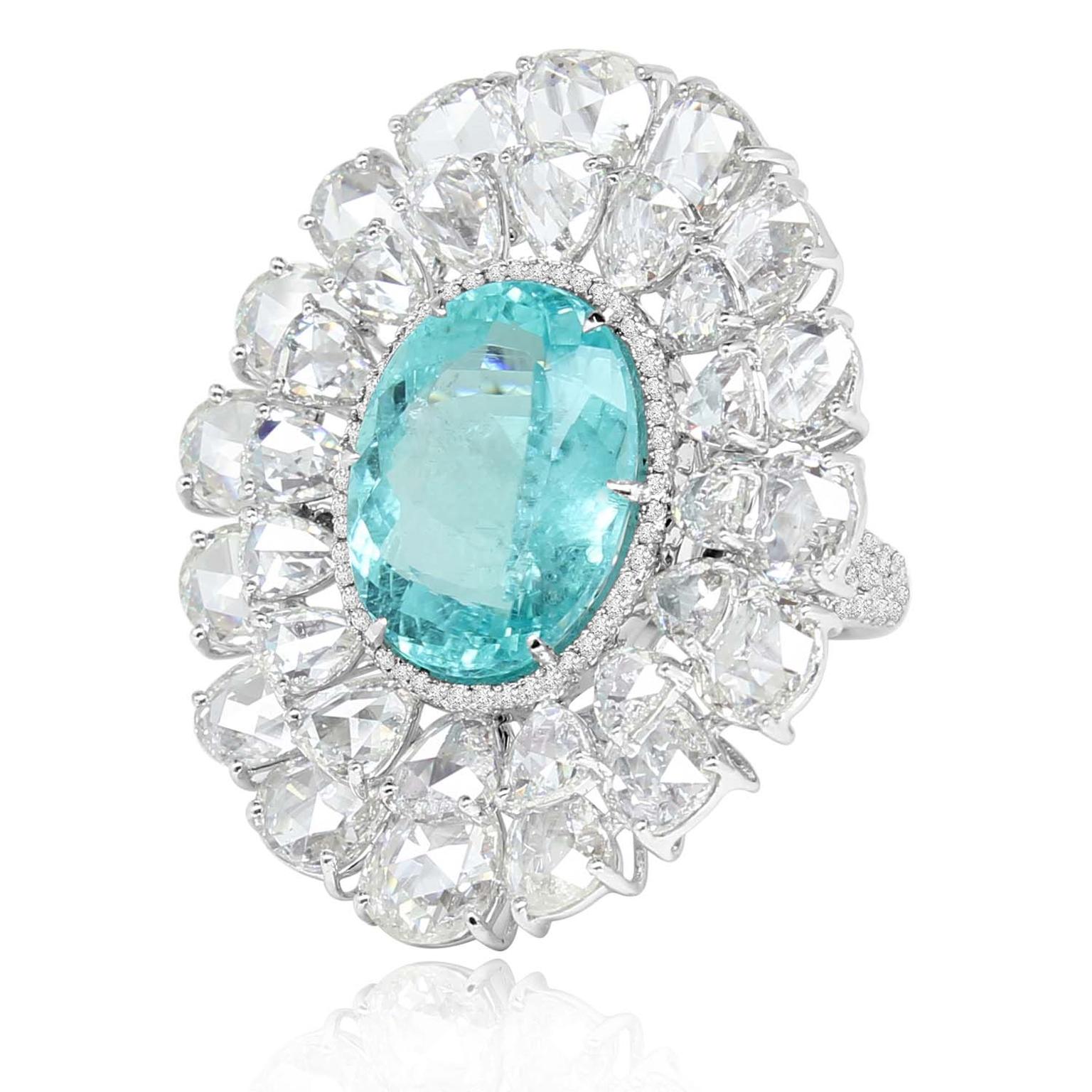 Sutra ring set with a Paraiba tourmaline and rose-cut diamonds, encircled by a diamond halo, in white gold.