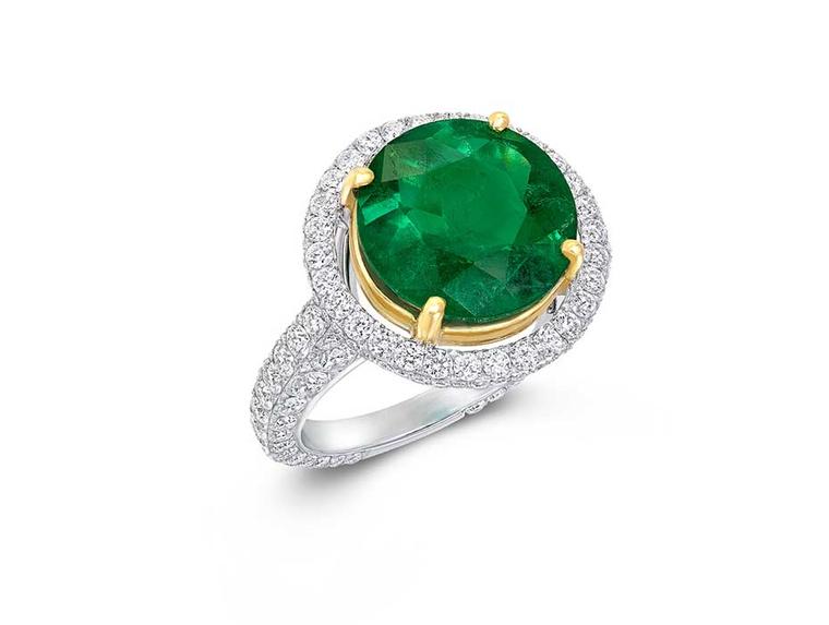 Graff emerald ring in white and yellow gold, set with a 3.78ct round-cut emerald and diamonds.
