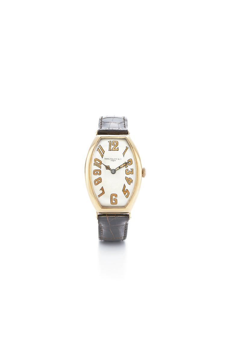 Art Deco Tonneau gold watch by Patek Philippe, circa 1923, restored by Fred Leighton.