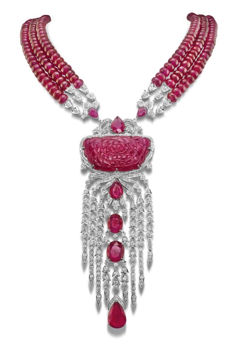 The House of Rose necklace with a carved ruby centre, strung on ruby beads and set with brilliant-cut diamonds and faceted rubies in white gold.