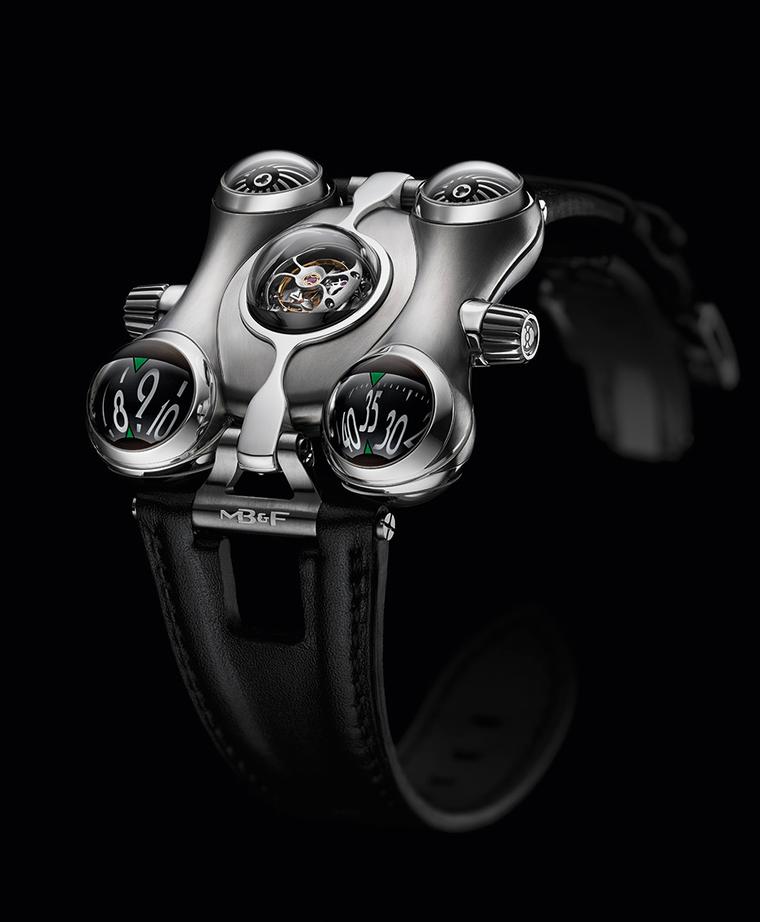 MB&F HM6 Space Pirate was inspired by a 1970s Japanese cartoon. Crafted in titanium, this lightweight ship features five bubble-domed pods on its hull: the front two for hours and minutes; the central one to show off the tourbillon; and the rear two to di