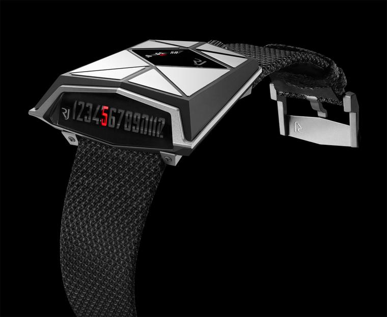 Romain Jerome Spacecraft watch has an unusual trapeze-shaped titanium case. The minutes are indicated on the surface of the spaceship while the retrograde hours are shown on a linear display