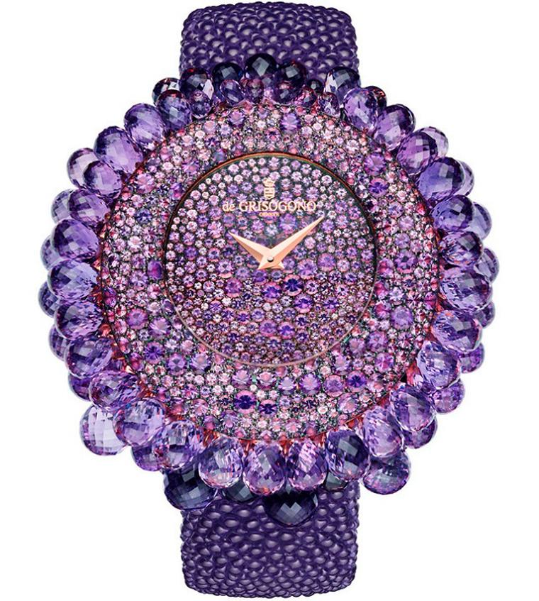 de GRISOGONO Grappoli high jewellery watch with snow-set amethysts on the dial and briolette-cut amethysts dangling from the bezel. Even the back of the pink gold case is set with stones and presented on a bubbly purple galuchat strap.