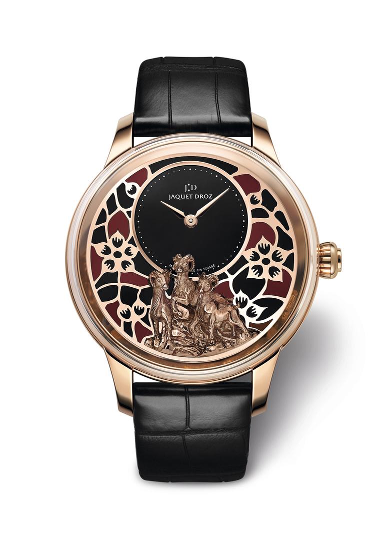 The red gold 41 mm Petite Heure Model by Jaquet Droz features the same plum blossom motif against a black onyx background. Both models, in red gold and white gold, are limited to 28 pieces.