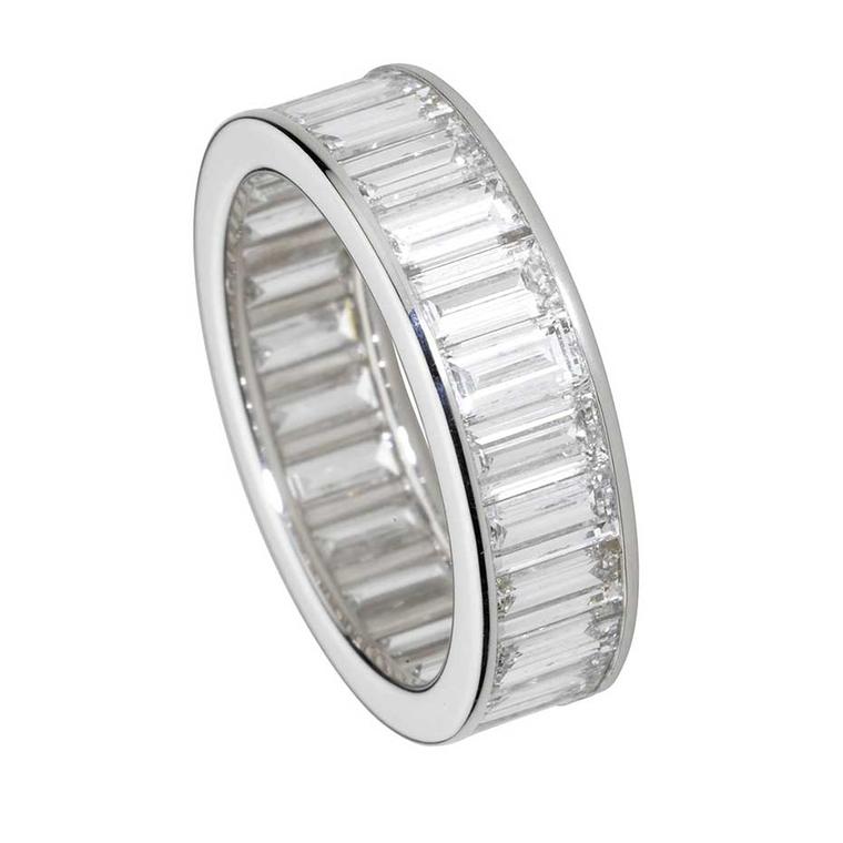 Cartier eternity ring in platinum, set with baguette-cut diamonds.