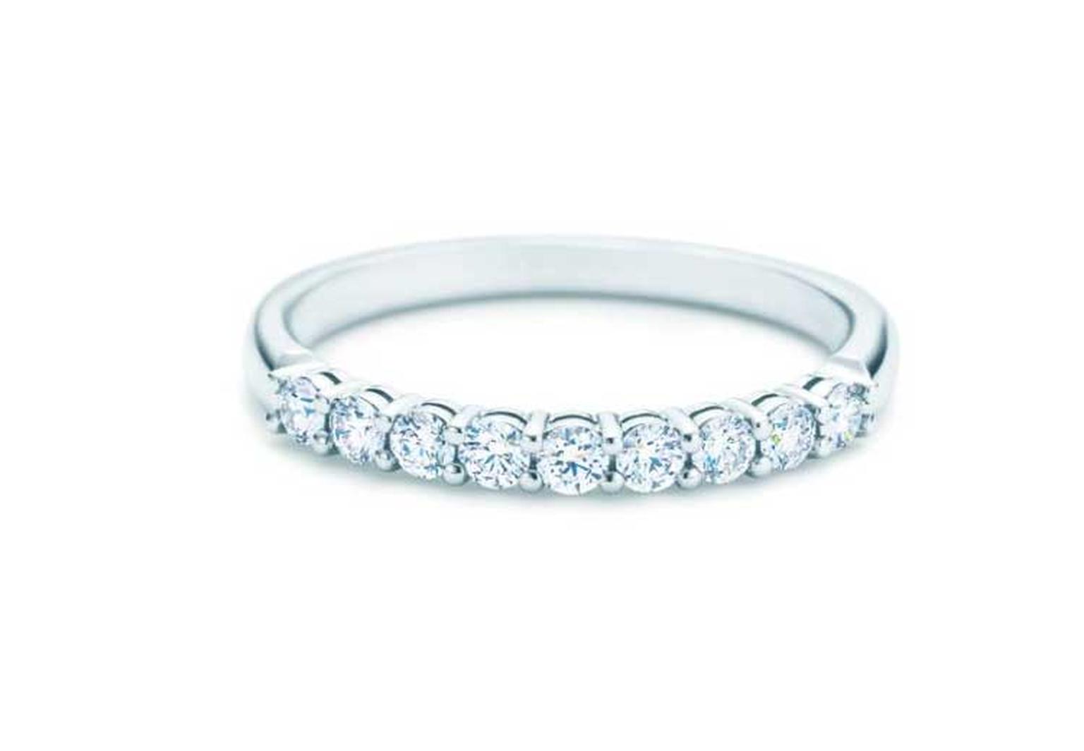 Tiffany & Co. half circle eternity ring in platinum, set with round brilliant diamonds.