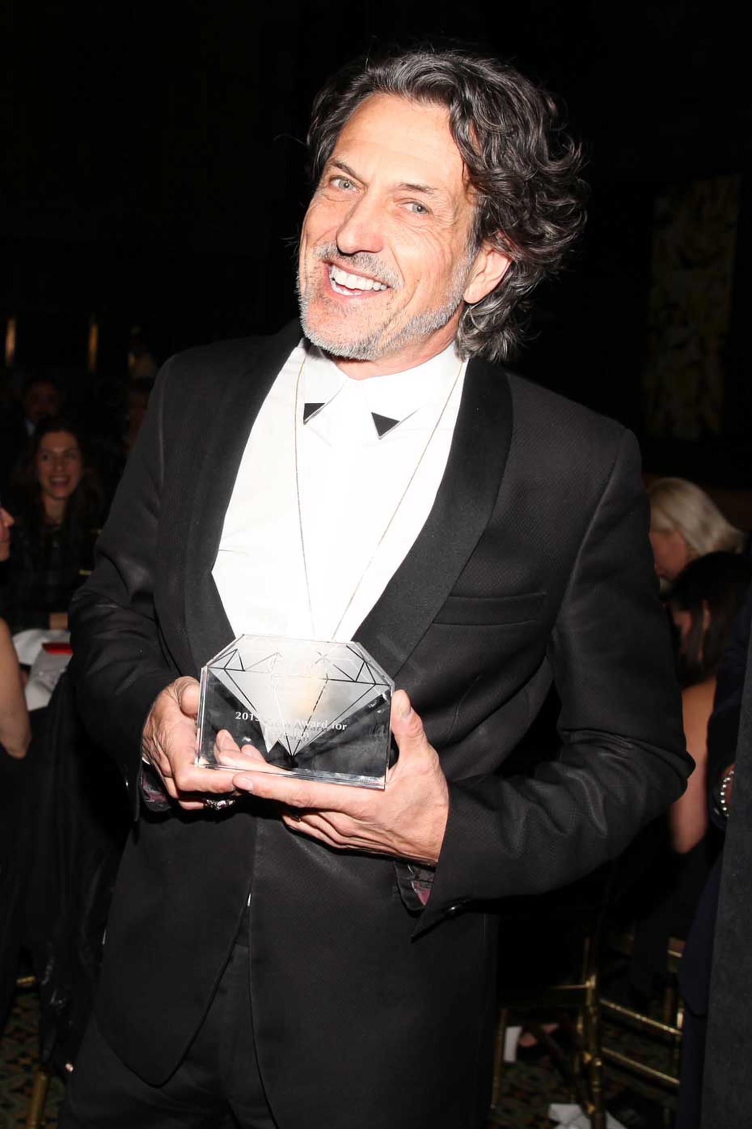 British jewelry designer Stephen Webster celebrates after receiving the award for Design at the 2015 Gem Awards. Image: Ben Rosser/BFAnyc.com