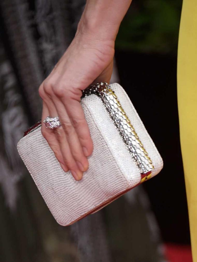A close-up of the Bulgari Serpenti cocktail clutch and ring worn by Naomi Watts at the 2015 Golden Globes.