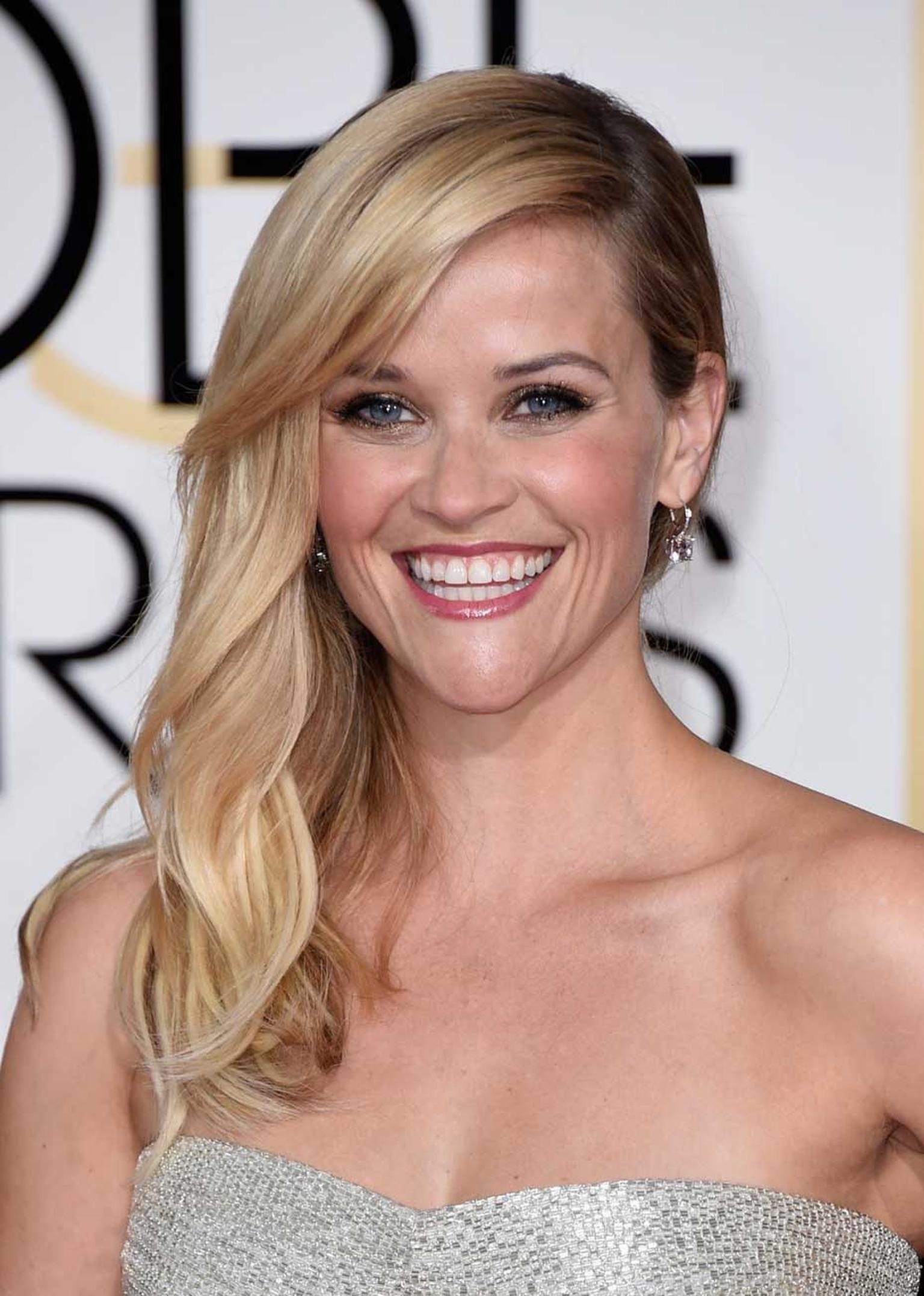 Reese Witherspoon in platinum and diamond earrings and ring from Tiffany & Co. at the 2015 Golden Globes.