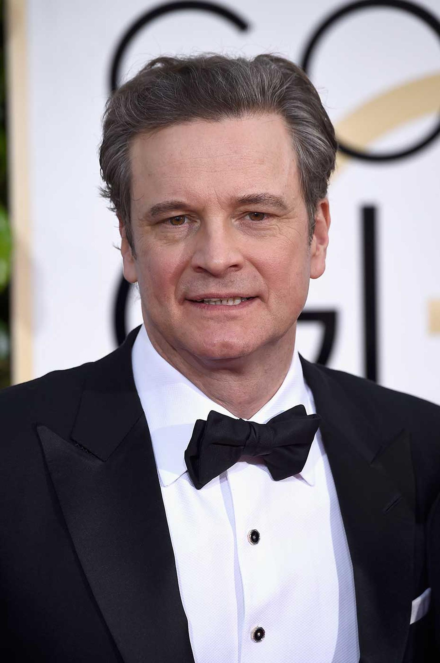 British actor Colin Firth wore an elegant Chopard L.U.C XPS watch in white gold with a black dial to the Golden Globe Awards 2015. (Getty Images)