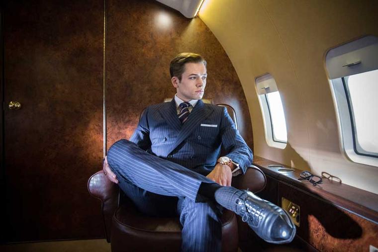 Taron Egerton pictured in the film wearing a Bremont Kingsman Special edition watch in rose gold.