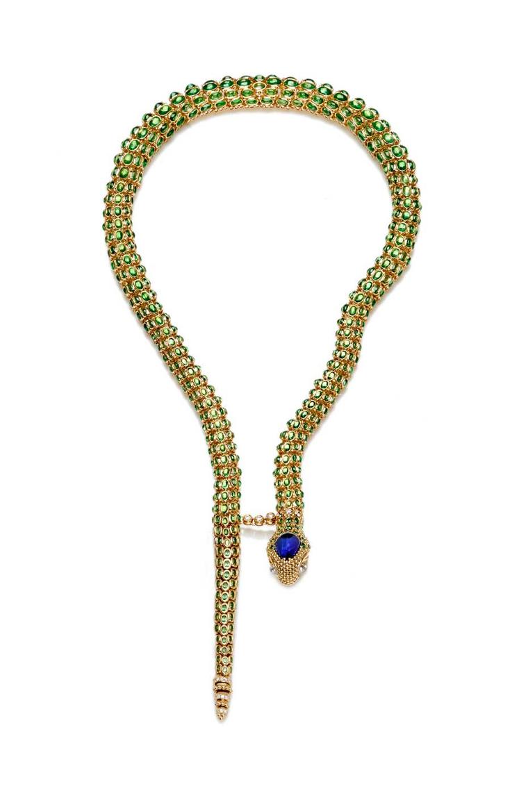 Temple St. Clair Secret Garden Serpent necklace in yellow gold with tanzanite, Royal Blue moonstone and diamonds. The skeleton of mobile gold vertebrae is set with more than 1,000 gemstones.