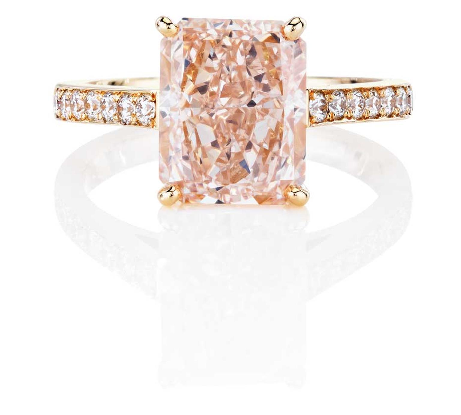 De Beers Classic pink diamond engagement ring, from the 1888 Master Diamonds collection, set with a Fancy pink diamond with pavé white diamonds around the band.